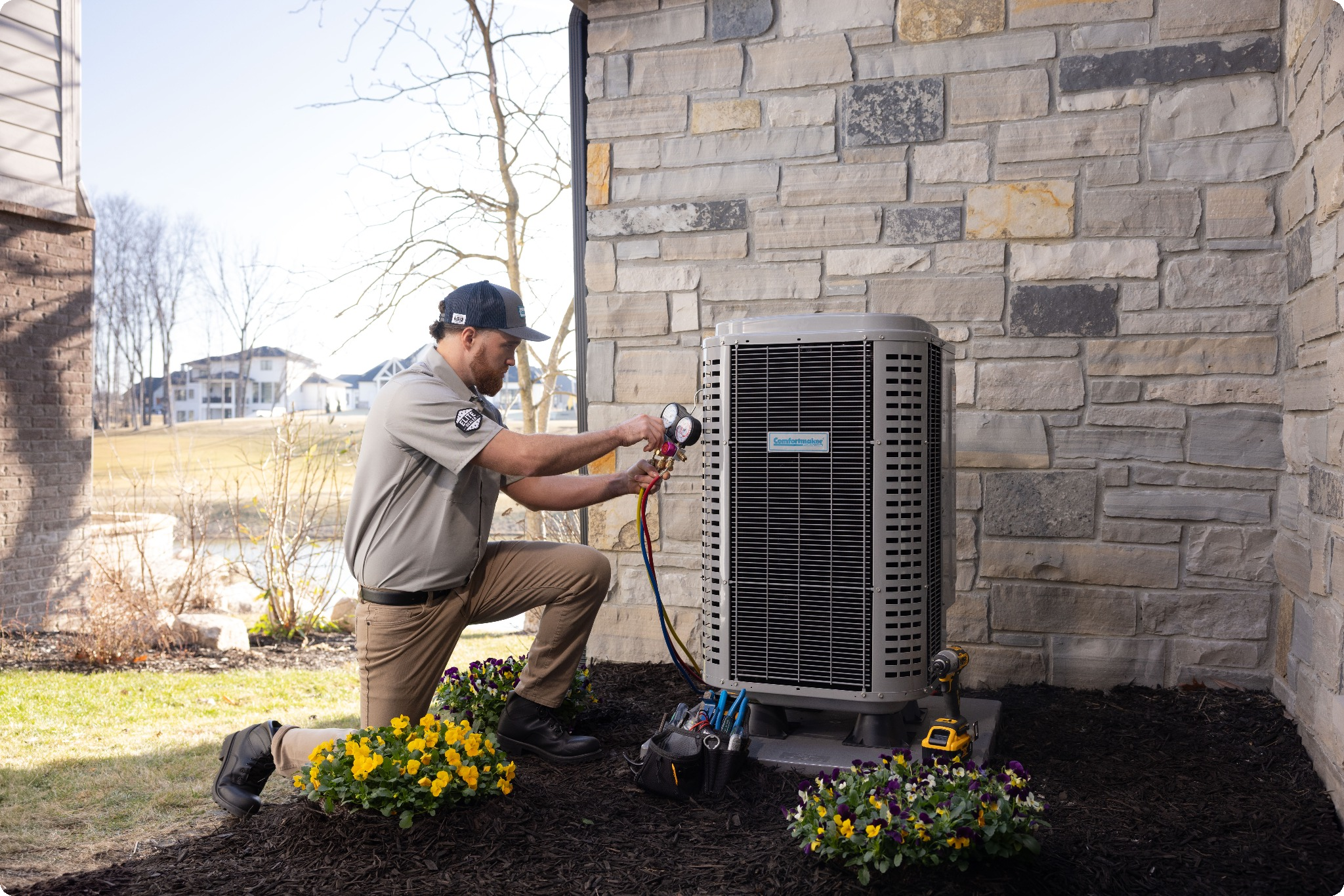 Southern Heating and Cooling technicians servicing a heating system in Central Kentucky